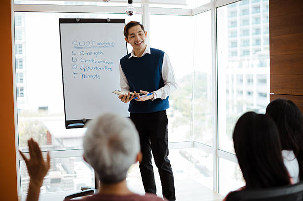 istock Open Dialogue Between Manager and Presenter in Office Meeting 2216202651