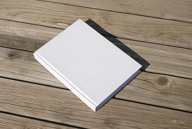 istock blank book mockup on rustic wooden background 2216209573