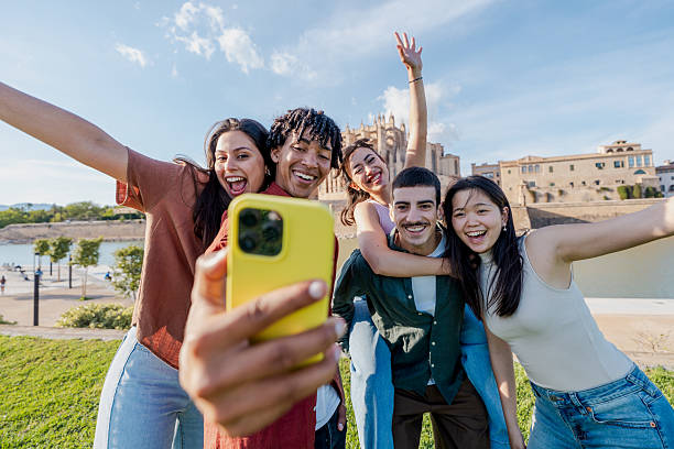 istock Multicultural young friends taking selfie in Mallorca 2216210355