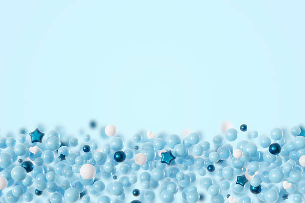 This 3D render showcases a boy-themed background filled with vibrant spheres in various shades of blue, white, and accents of teal, providing ample copy space for customization and creativity.