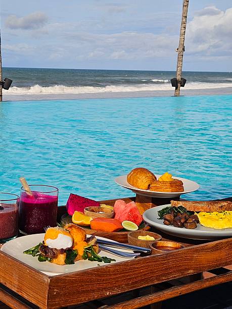 istock Tropical Beachside Breakfast by the Infinity Pool | Bali Vacation | Luxury Resort 2216213092