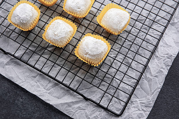 istock Soft confectionery treats cooling on a wire rack in a kitchen 2216217630