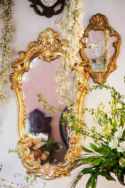 istock Elegant vintage mirrors adorned with flowers in a charming interior space 2216217878
