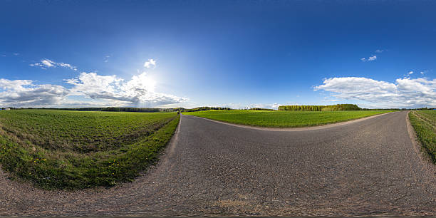 istock Full seamless spherical hdri panorama 360 degrees angle view on among fields in spring day with awesome clouds in equirectangular projection, ready for VR AR virtual reality content 2216219460