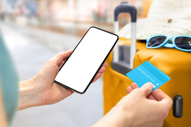 istock woman paying for purchase or booking online 2216222384