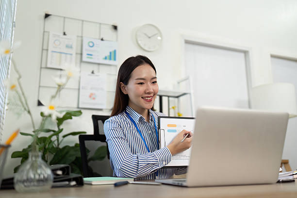 istock Engaging Presentation. Young businesswoman explaining data insights during a video call. 2216234999