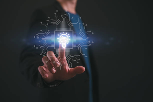 istock artificial intelligence AI technology and Digital transformation concept, businessman holding or touching ai with light bulb icon 2216242195