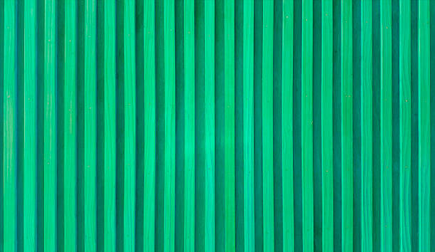 istock uniformly textured surface composed of numerous parallel, abstract light green wooden slats arranged vertically, creating a clean and simple pattern. 2216258521