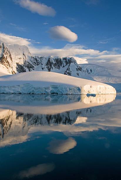 istock Antarctic landscape with snow-covered mountains and reflections. 2216259174