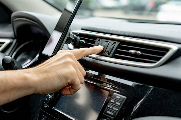 istock Driver activating emergency lights in car 2216267599