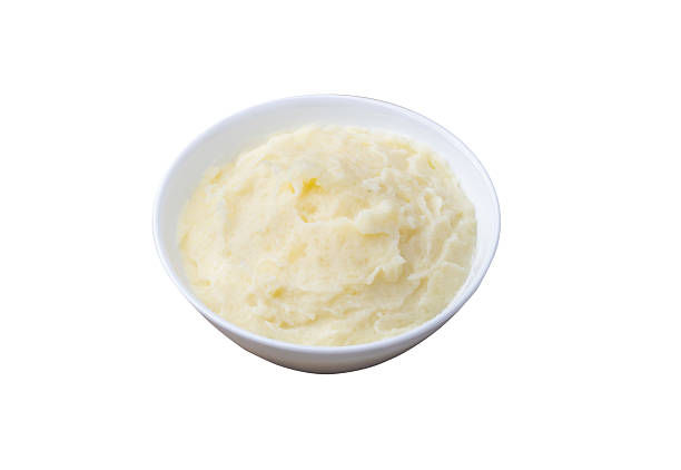 istock Mashed potatoes in a bowl isolated over white background 2216269726