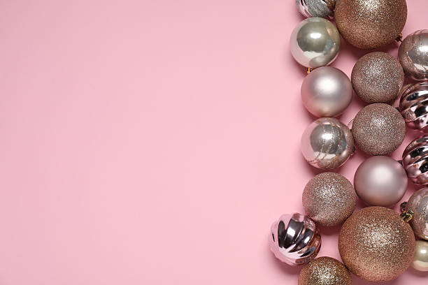 istock Shiny Christmas baubles on pink background, flat lay. Space for text 2216270441