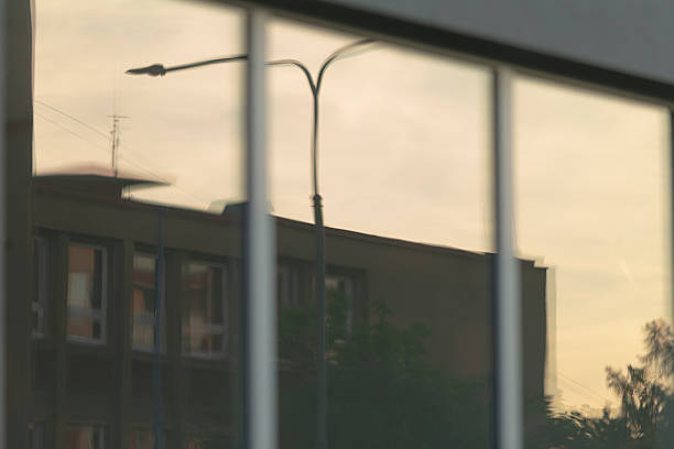 Exploring Reflections in Glass A Deep Dive into Urban Landscape and Streetlight