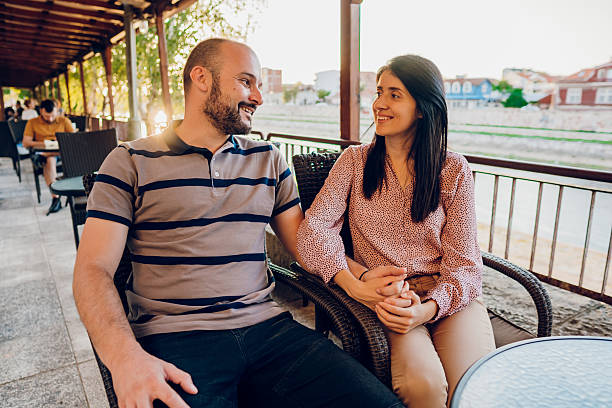 istock Happy couple enjoy in cafe 2216273427