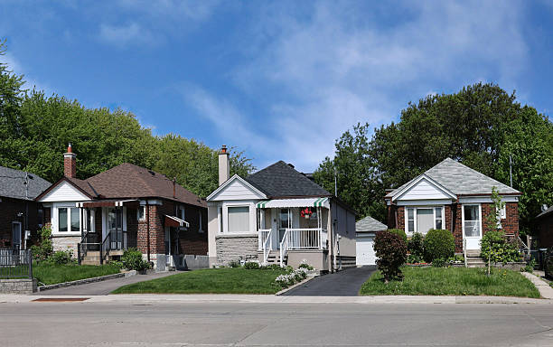 istock street with old fashioned small bungalow houses 2216273709