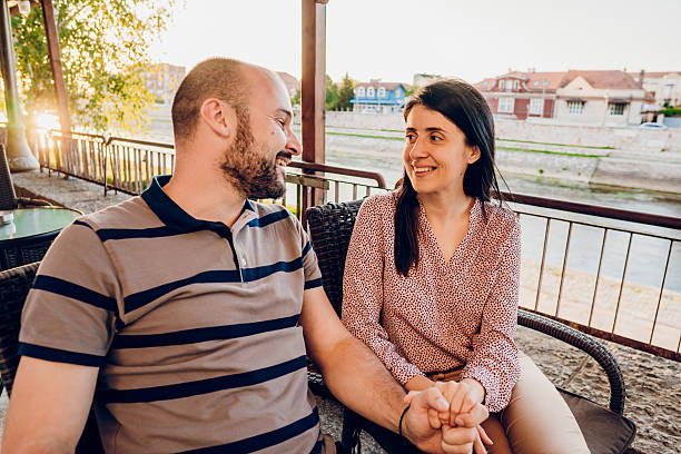 istock Happy couple enjoy in cafe 2216273719