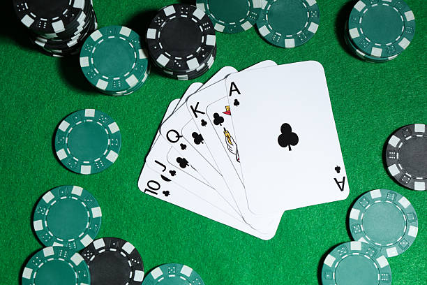 istock Playing cards and poker chips on green table, flat lay 2216274769