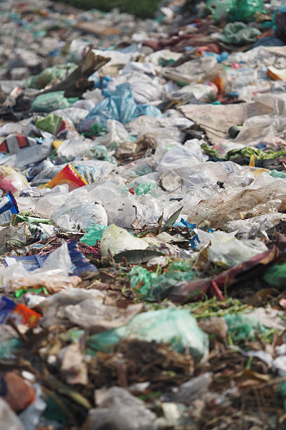 istock Plastic waste littering a natural landscape in daylight 2216276351