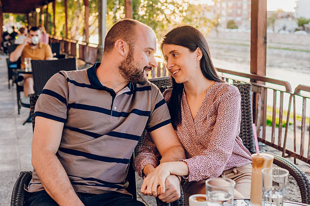 istock Happy couple enjoy in cafe 2216277059