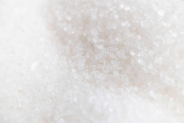 istock closeup of granulated sugar, background, texture, pattern 2216277772