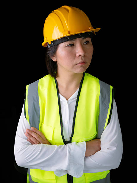 istock factory woman workers or technicians civil Engineer or Architecture project management standing with arms crossed. 2216278406