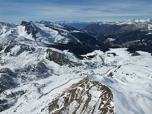 istock Snow-Covered Mountain Landscape with Winding Roads 2216280622