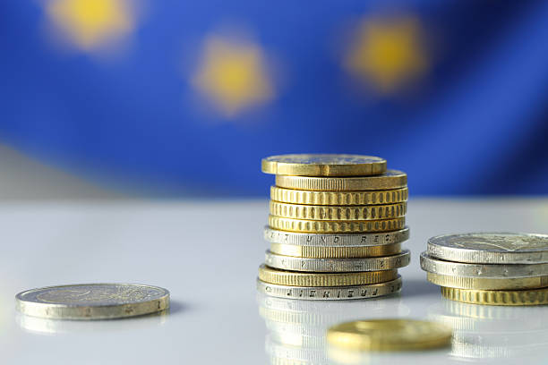 istock Many different euro coins on table, closeup 2216281057