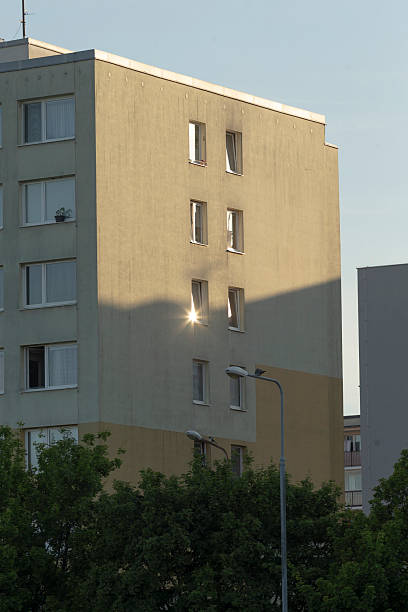 istock Modern Apartment Building with Unique Window Design at Sunset 2216282508