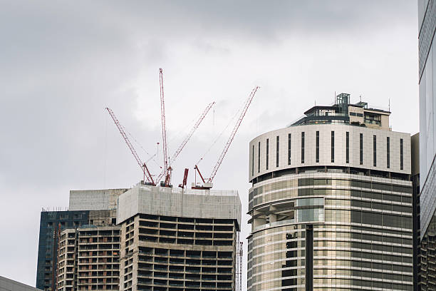 Building site with cranes. Construction Industry, Construction Machinery, Construction Site. Building construction. City Development.