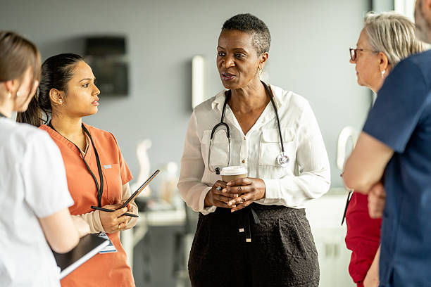 istock Medical Team Having a Discussion in a Hospital Setting 2216289626