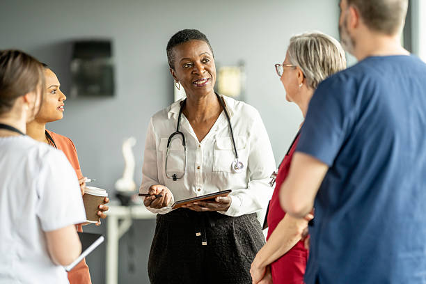 istock Medical Team Having a Discussion in a Hospital Setting 2216289632