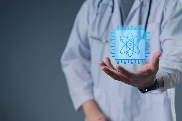 istock Doctor in lab coat presenting a futuristic digital chip with atom icon, symbolizing innovation in medical technology, healthcare AI, and quantum computing for modern science. 2216290500