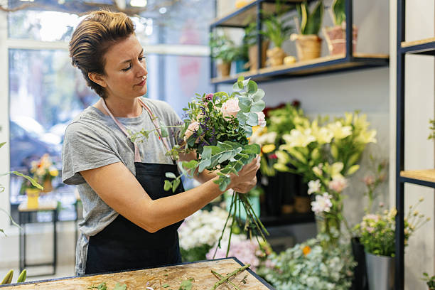 istock Florist arranging a bouquet 2216290800