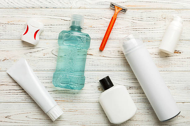 istock Mockup for bathing products top view flat lay, spa razor, toothpaste, soap, gel and other various accessories. Cosmetics for skin health. Bath Mockup for your logo 2216292711