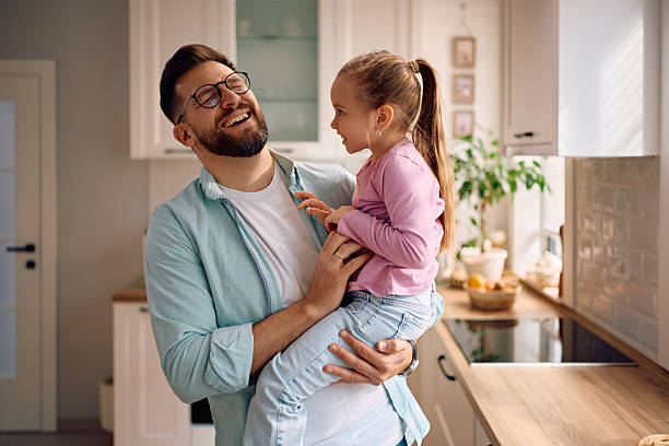istock Cheerful father and daughter having fun at home. 2216296537