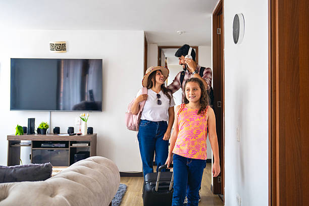 istock Happy family leaving home ready for vacation 2216296719