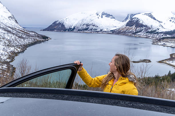 istock Woman Enjoying Scenic Mountain View from a Car 2216299907