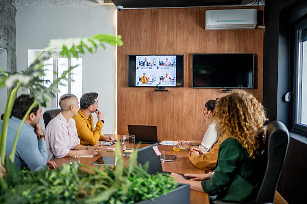 istock Business team having video conference in modern office 2216300522