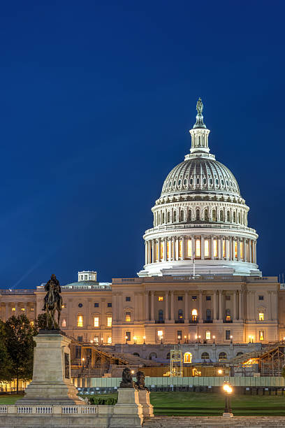 istock The illuminated United States Capitol at night 2216302366