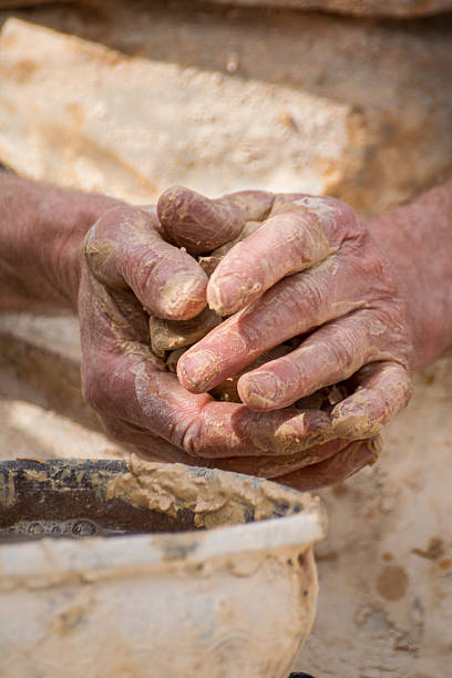 istock hands covered in clay working on ceramics, creative process of handmade pottery art 2216303493