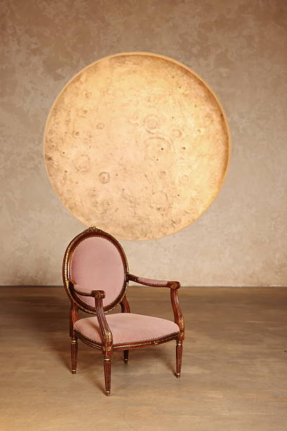 An Elegant Chair and a Round Table Composition in Soft, Muted Tones for a Cozy Atmosphere