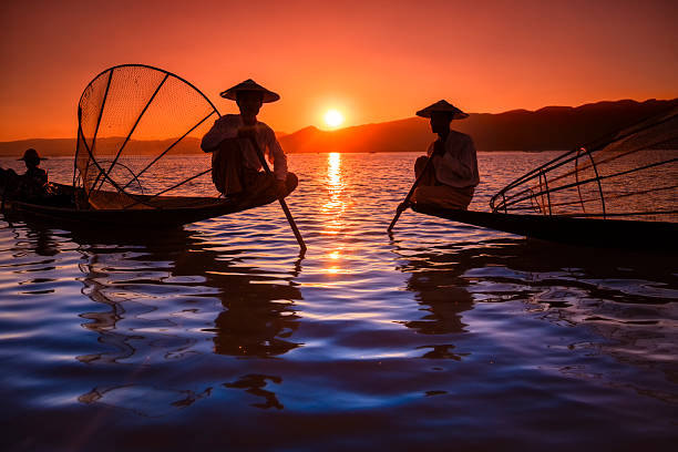 istock Fishermen on Inle Lake watching the sunset, Myanmar 2216307186