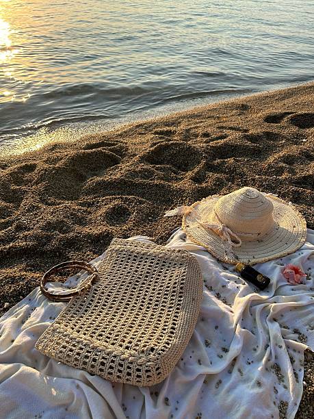 istock Beach Picnic Setup at Golden Hour 2216310126