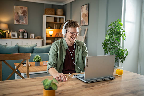istock Young man working from home having a video call on his laptop 2216313777