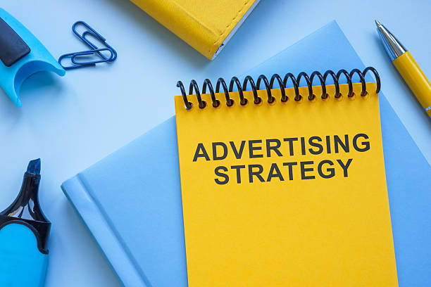 istock Advertising strategy on a desk. Marketing execution. 2216321615