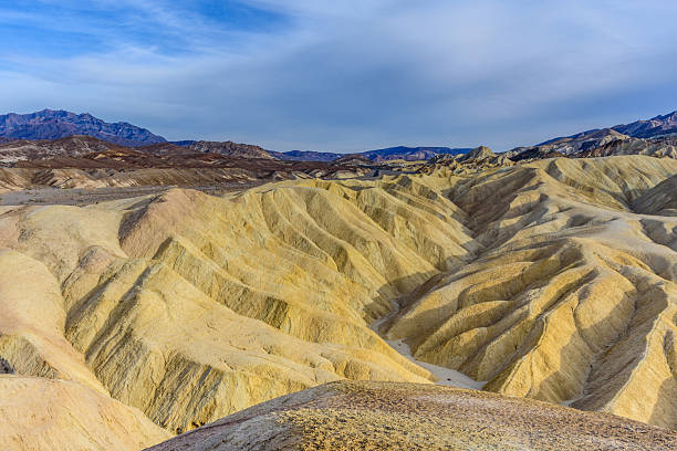 The colorful landscape seen at Zabriskie  Point extends several miles to the southeast.  These spectacular multi-colored \