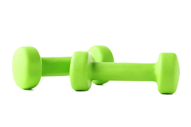 istock Green dumbbells isolated on white background 2216326239