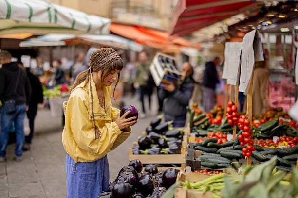 istock Choosing vegetables at a Sicilian market 2216327120