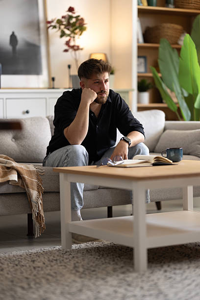 istock Pensive lost in thoughts suffering from depression 2216327127