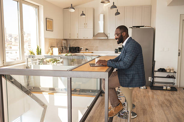 istock Business professional working from a modern and bright home office space 2216331106